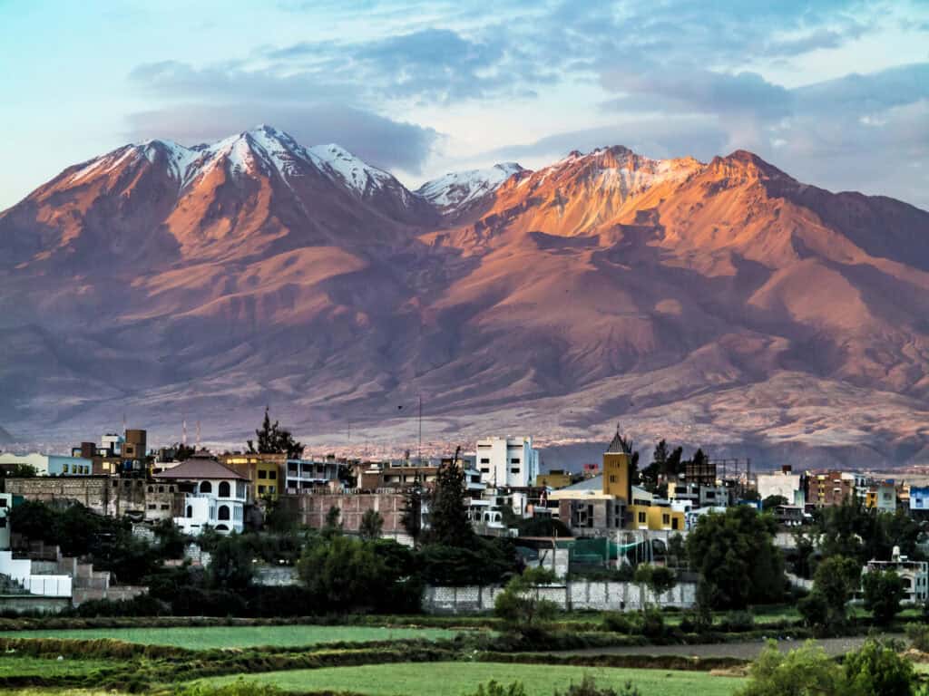 Arequipa Peru skyline with El Misti volcano and Andes mountains at sunset