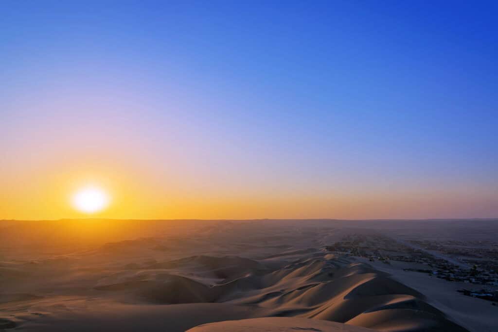 Sunset from sand dunes in Huacachina Peru